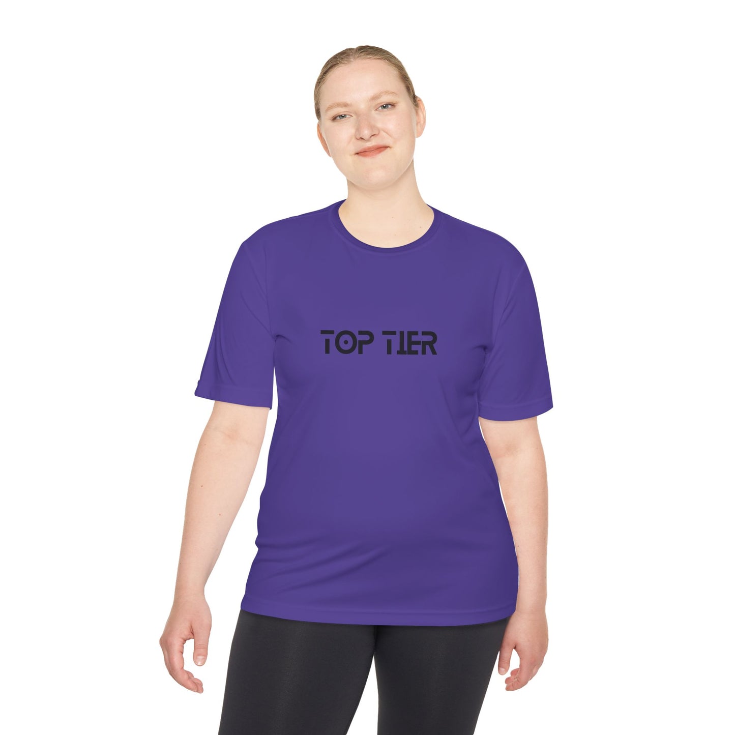 Black Top Tier Performance Tee T-shirt by Printify displayed on a flat lay with branding and fabric details visible.